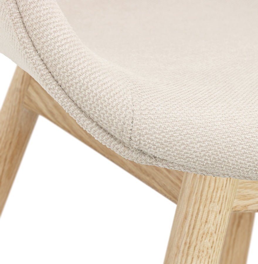 Veranova | Luxe beige fauteuil met armleuningen – natuurlijk houten poten
